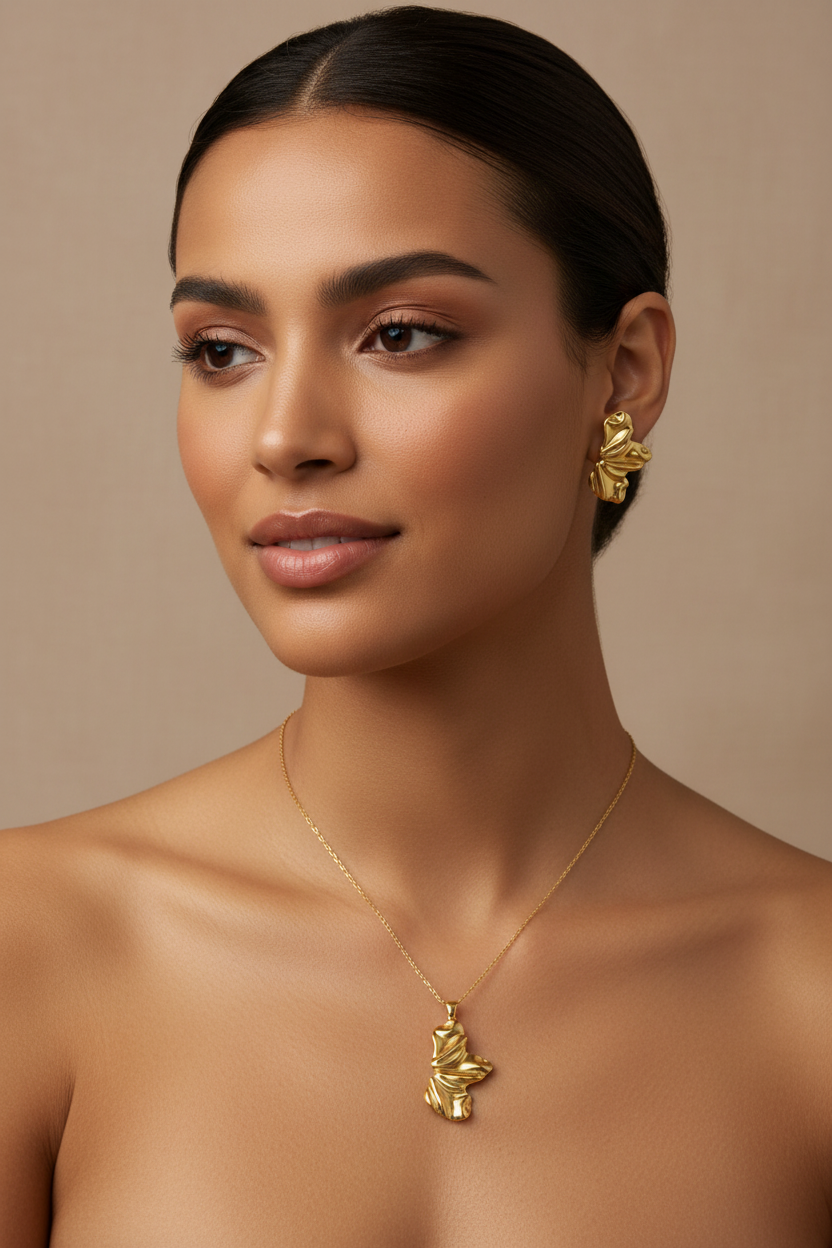 Model wearing the 18K Gold Plated Abstract Pleated Flower Petal Pendant Necklace and Earring Set